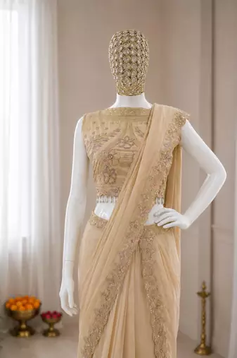 Beige georgette embroidered saree with sequins work