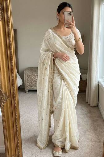 Cream satin embroidered saree with sequins work