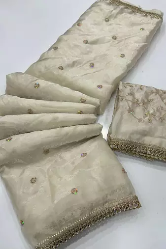 Cream satin embroidered saree with sequins work