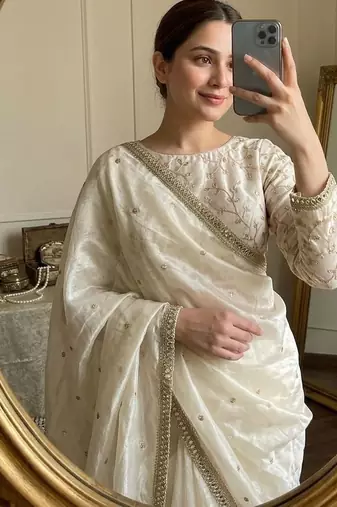 Cream satin embroidered saree with sequins work