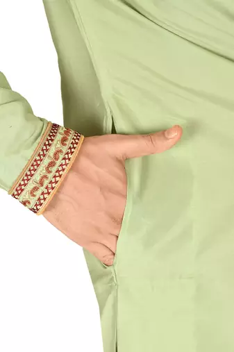 chatni green cotton silk   kurta with  hand work on collor button neck and mohri
