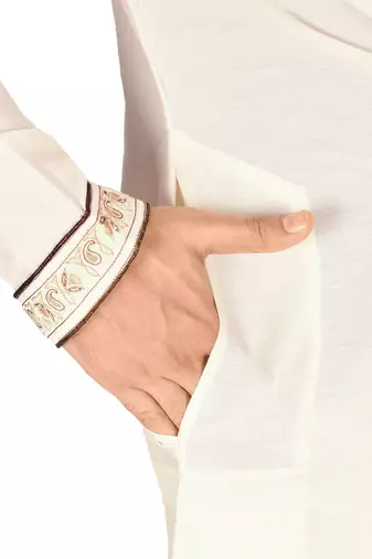 cream cotton silk   kurta with  hand work on collor button neck and mohri