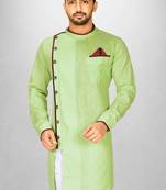 green slub cotton  kurta with asymmetrical side open patttern