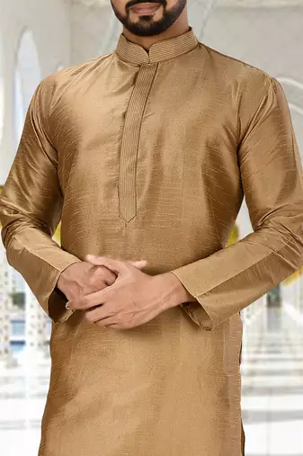 Gold dupion art silk  kurta with machine dk work in collar and button line