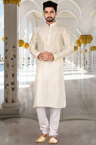 Off white dupion art silk  kurta with computerised embroidery machine work churidar