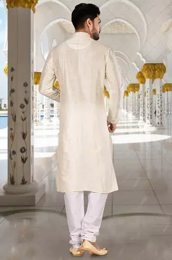 Off white dupion art silk  kurta with computerised embroidery machine work churidar