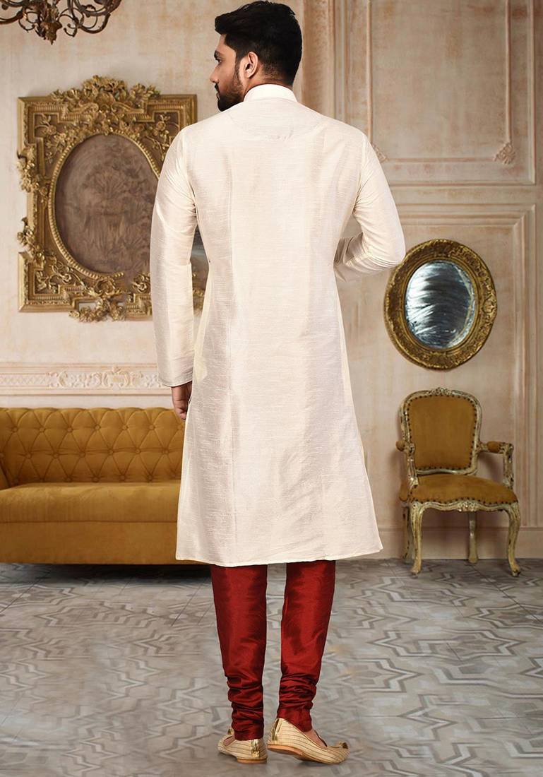 Cream dupion art silk  kurta with pattern work and 8 button churidar