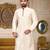 Cream dupion art silk  kurta with pattern work and 8 button churidar