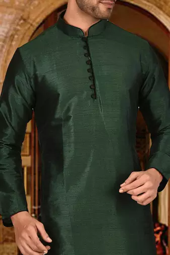 Bottle green dupion art silk  kurta with pattern work and 8 button churidar