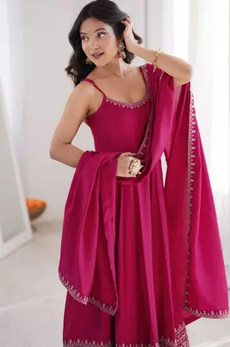Graceful sleeveless anarkali suit with intricate hem embroidery