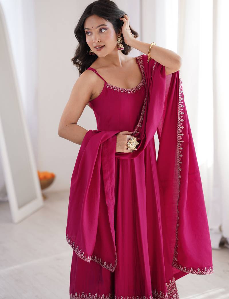Graceful sleeveless anarkali suit with intricate hem embroidery