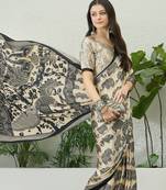 Cream color modern pre-stitched semi modal saree with unstitched designer blouse