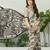 Cream color modern pre-stitched semi modal saree with unstitched designer blouse