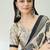 Cream color modern pre-stitched semi modal saree with unstitched designer blouse