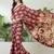 Red color modern pre-stitched semi modal saree with unstitched designer blouse