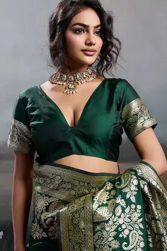 Green colour silk blend saree with rich gold zari work