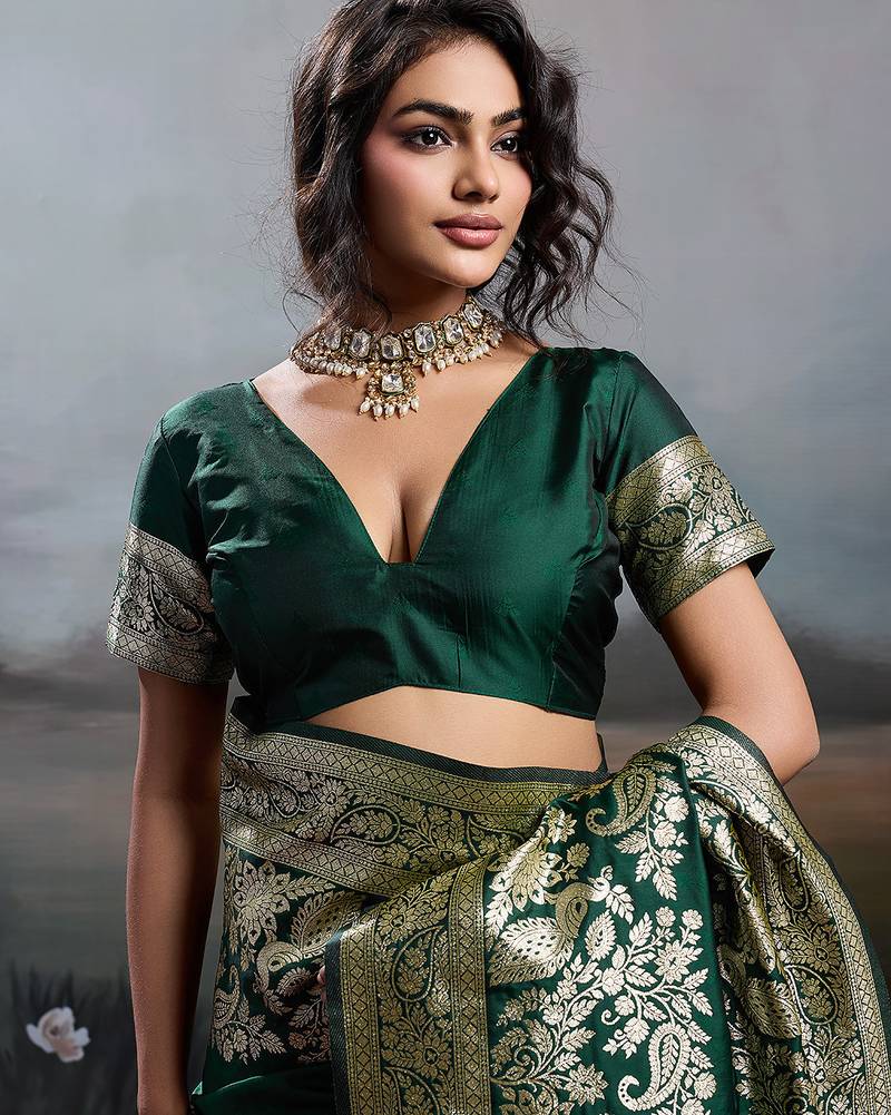 Green colour silk blend saree with rich gold zari work