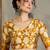 Yellow color ready pleated saree with unstitched designer blouse