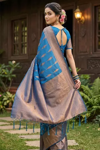 Blue colour silk blend woven saree with rich zari border and elegant tassels