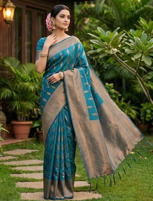 Teal colour silk blend woven saree with rich zari border and elegant tassels 1