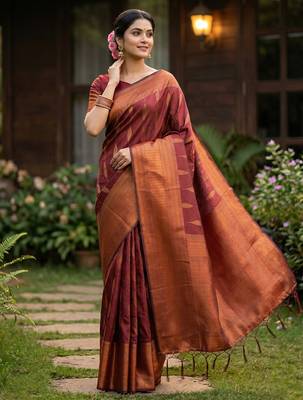 Maroon colour silk blend woven saree with rich zari border and elegant tassels 1