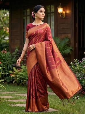 Maroon colour silk blend woven saree with rich zari border and elegant tassels 2