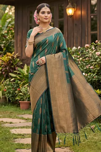 Green colour silk blend woven saree with rich zari border and elegant tassels