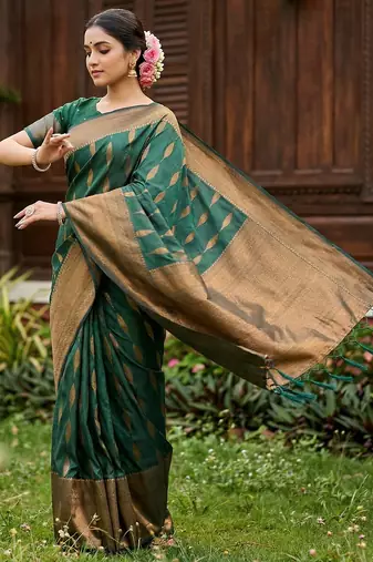 Green colour silk blend woven saree with rich zari border and elegant tassels