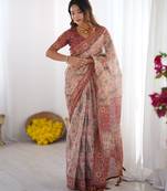 Beige colour ready to wear saree with unstitched bloure