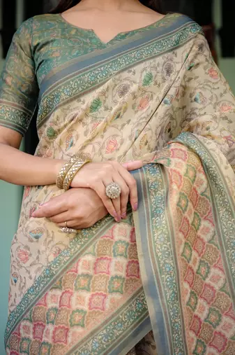 Ivory colour ready to wear saree with unstitched bloure