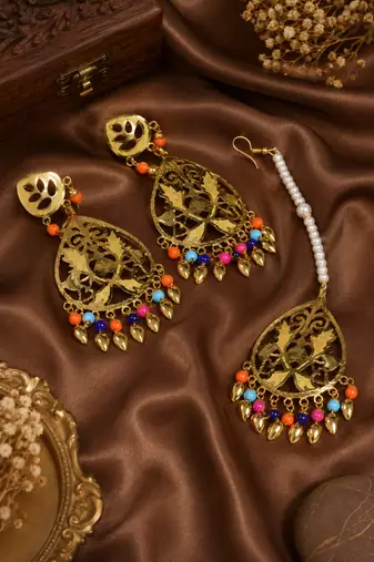 Festive floral earrings and tikka set