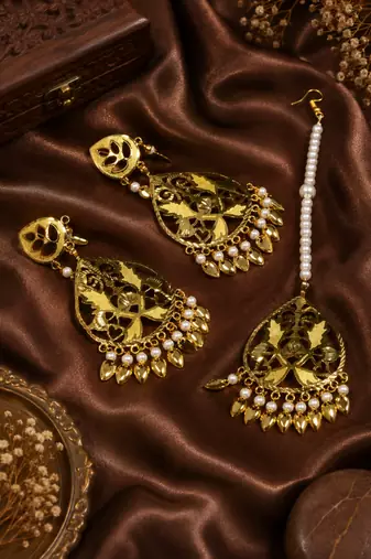 Classic floral statement earrings and tikka
