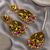 Festive floral earrings and tikka set