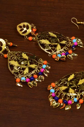 Festive floral earrings and tikka set