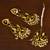 Classic floral statement earrings and tikka