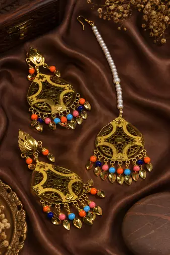 Festive multicolor gold tone earrings and tikka set