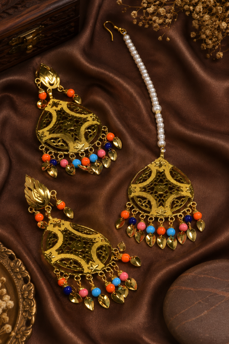 Festive multicolor gold tone earrings and tikka set