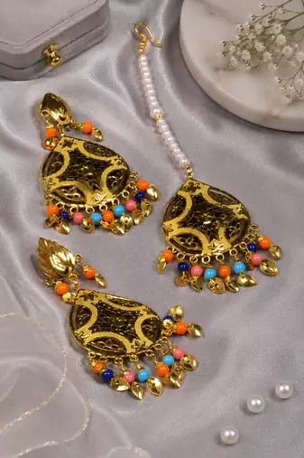 Festive multicolor gold tone earrings and tikka set