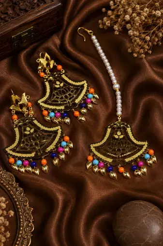 Festive lotus beaded earrings and maang tikka
