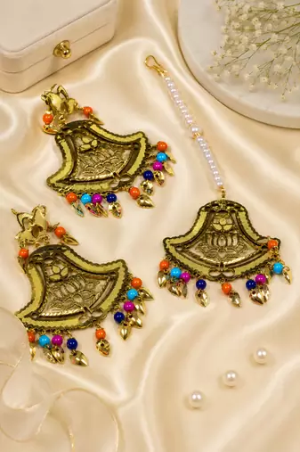 Festive lotus beaded earrings and maang tikka