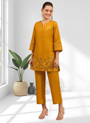 Women's cotton linen yellow embroidered short kurta with pant 3