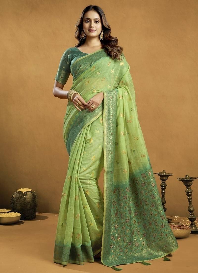 Shaded green spun cotton zari saree with rich pallu