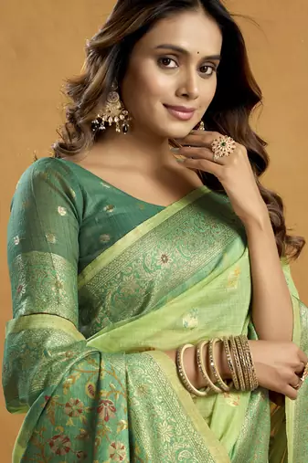 Shaded green spun cotton zari saree with rich pallu