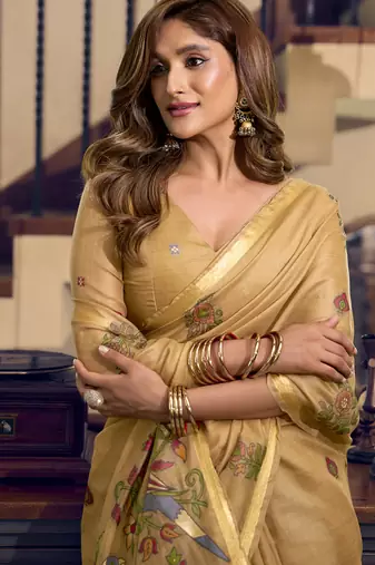 Cream kolkata cotton saree with litchi work & fancy tassels