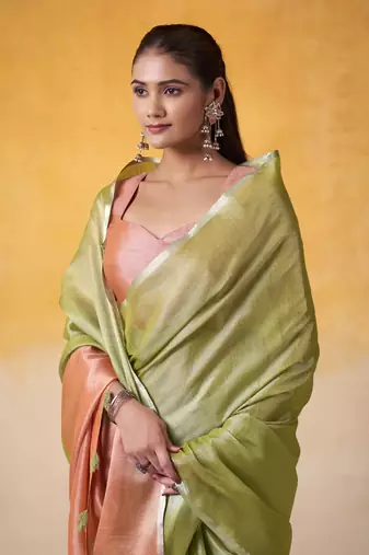 Olive tissue silk with beautiful tussle on pallu casual  wear saree