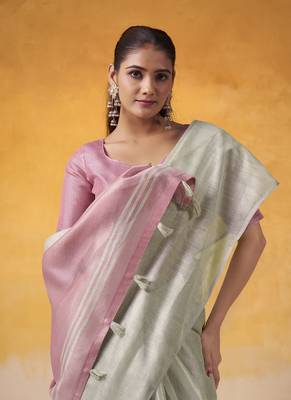 Off-white tissue silk with beautiful tussle on pallu casual wear saree 3