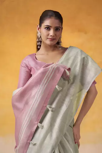 Off-white tissue silk with beautiful tussle on pallu casual wear saree