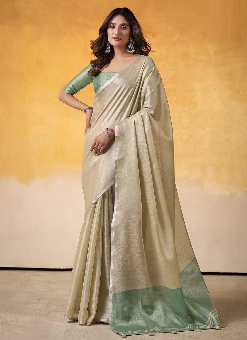 Beige tissue silk with beautiful tussle on pallu casual wear saree