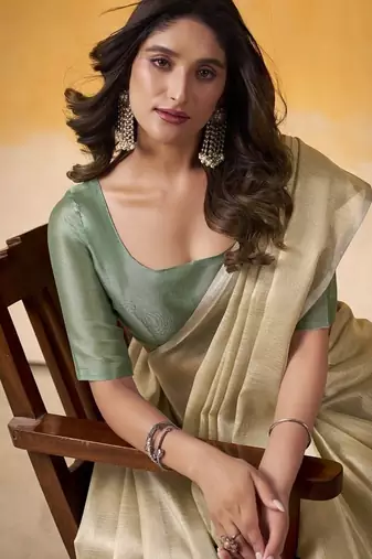 Beige tissue silk with beautiful tussle on pallu casual wear saree