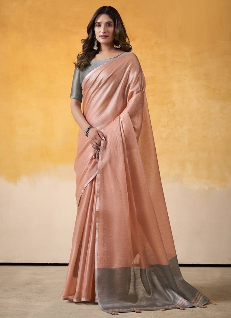 Peach tissue silk with beautiful tussle on pallu casual  wear saree
